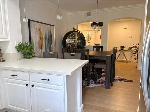 a view of a livingroom with furniture and front door