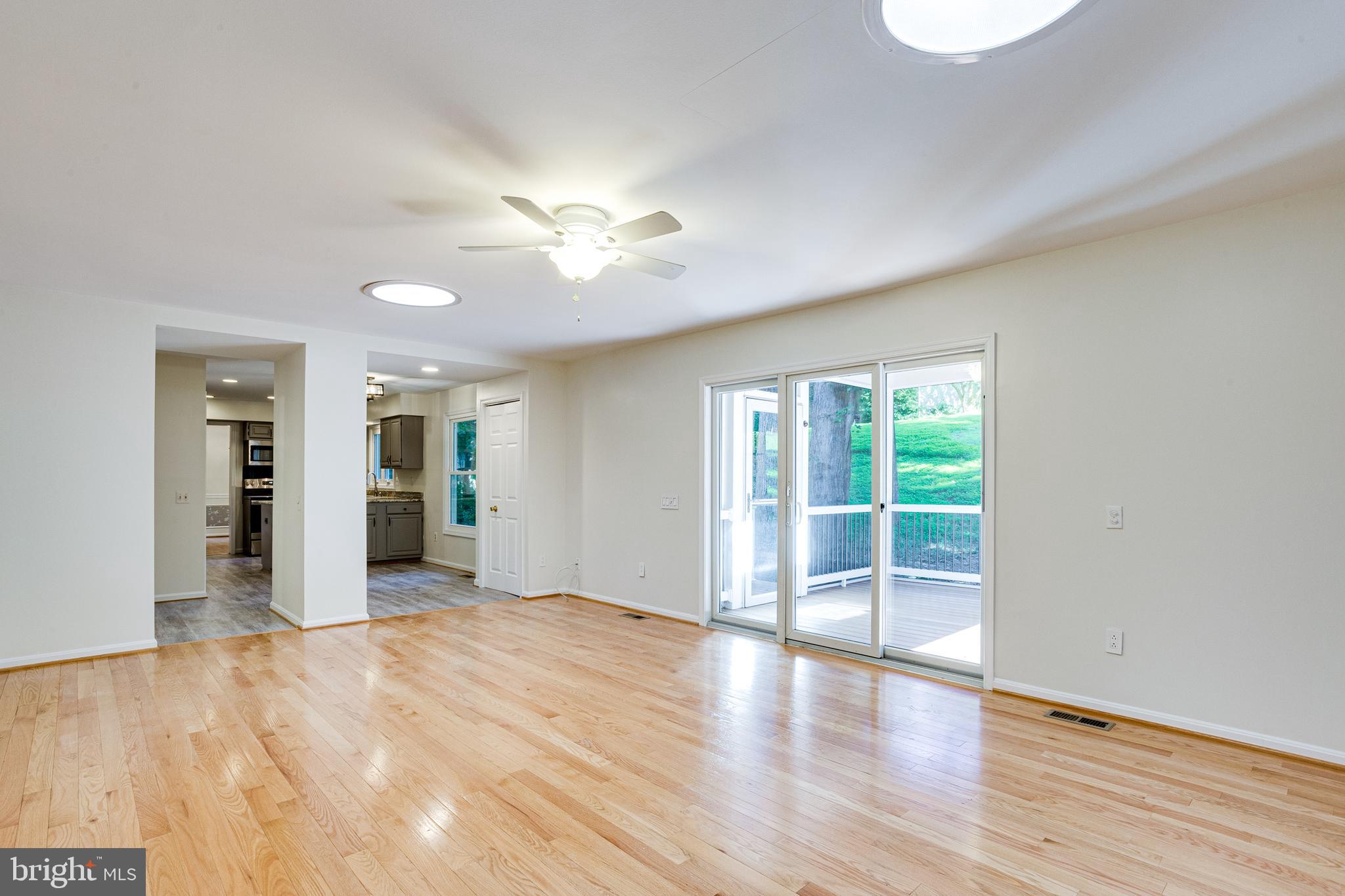 11300 Classical Lane Silver Spring, MD 20901 - Photo 18 of 50 Family Room- Sliding Glass Door to Screened Porch!