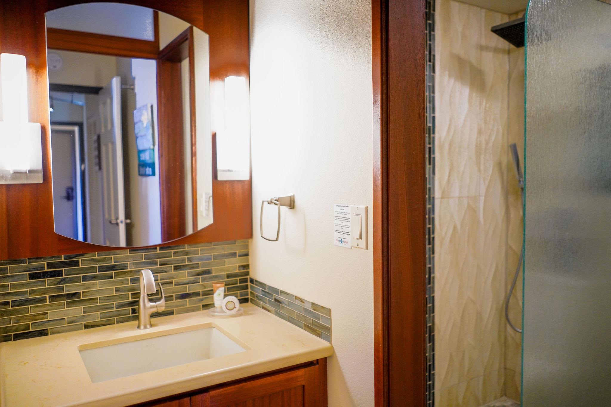 1032 South Kihei Road, Unit B420 Kihei, HI 96753 - Photo 13 of 47 a bathroom with a sink and a mirror