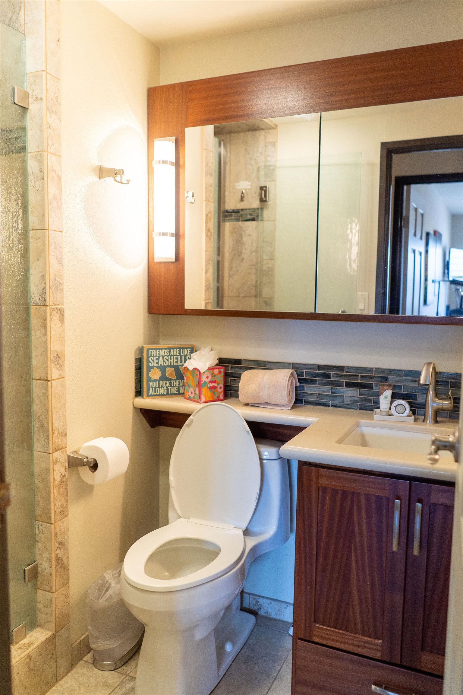 1032 South Kihei Road, Unit B420 Kihei, HI 96753 - Photo 14 of 47 a bathroom with a toilet sink and mirror