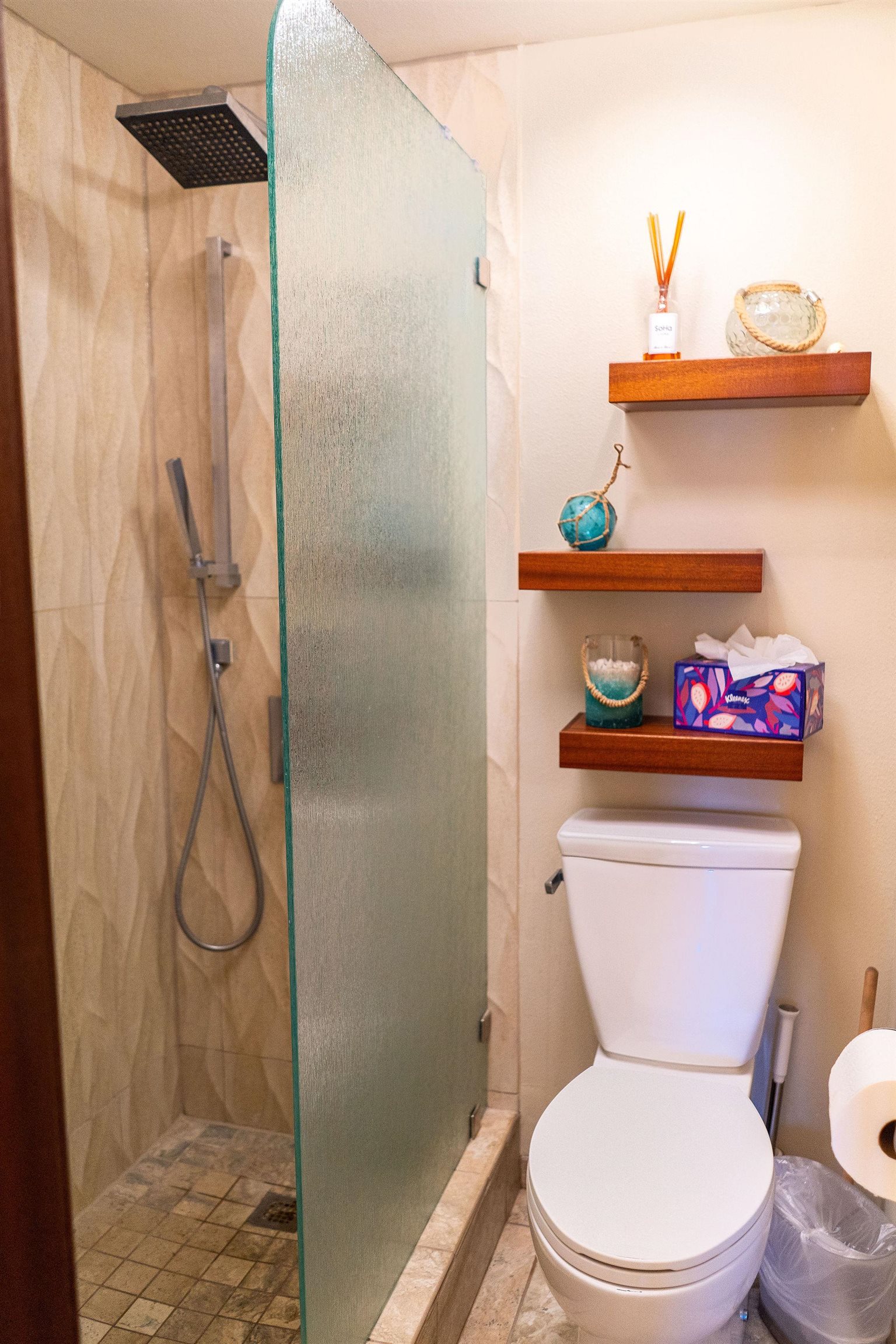 1032 South Kihei Road, Unit B420 Kihei, HI 96753 - Photo 18 of 47 a white toilet sitting next to a bathroom sink