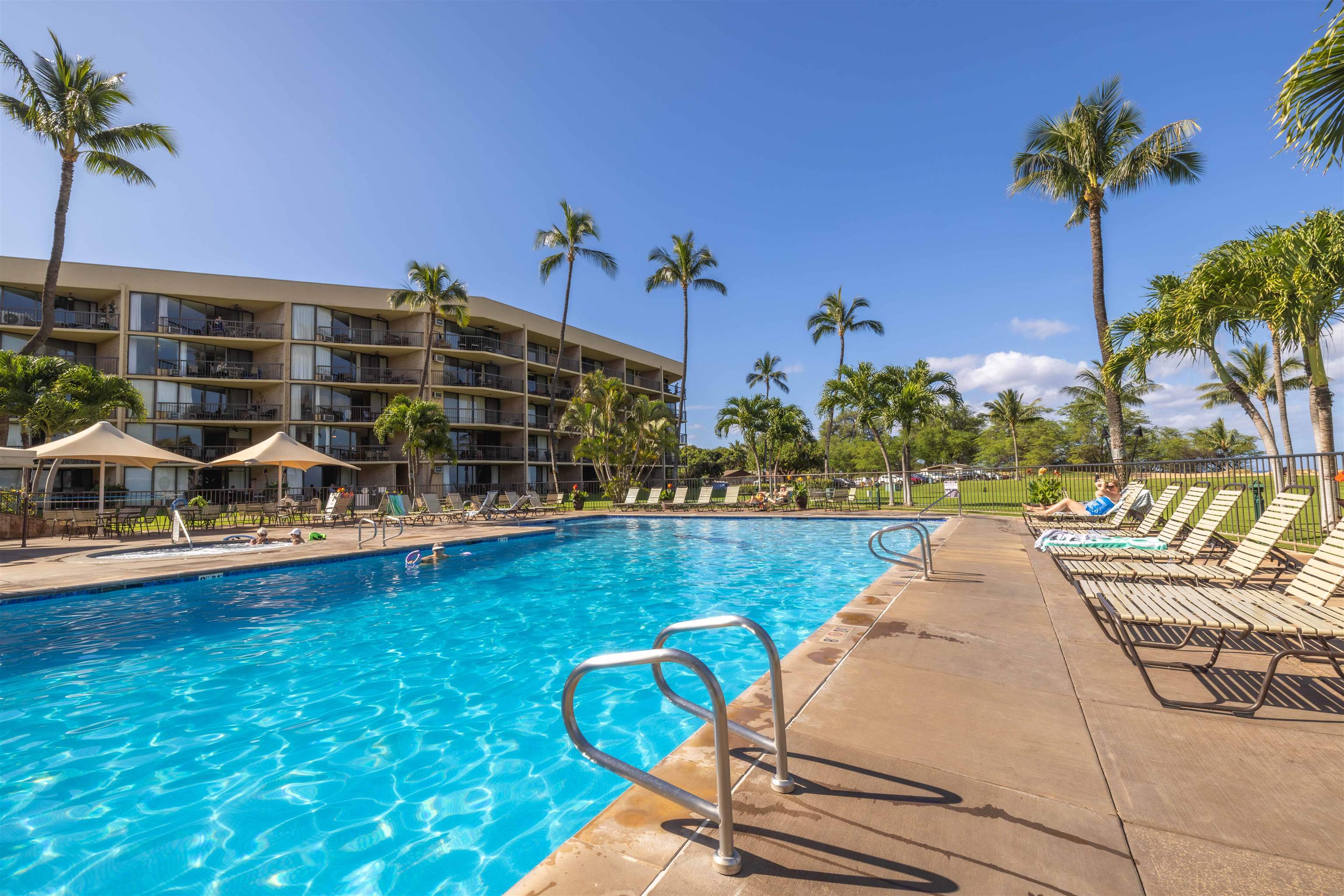 1032 South Kihei Road, Unit B420 Kihei, HI 96753 - Photo 25 of 47 a view of swimming pool with outdoor seating