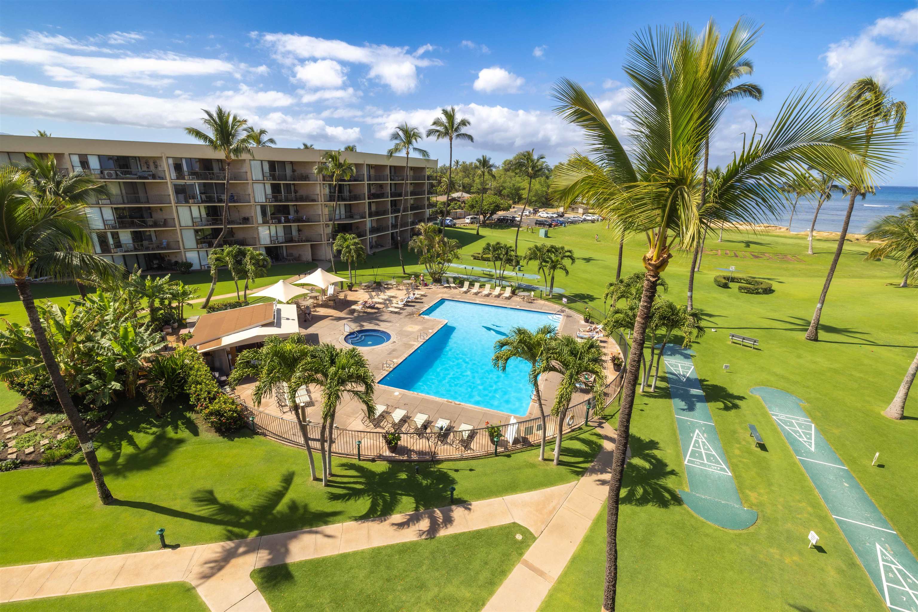 1032 South Kihei Road, Unit B420 Kihei, HI 96753 - Photo 29 of 47 a view of a chairs and table in patio