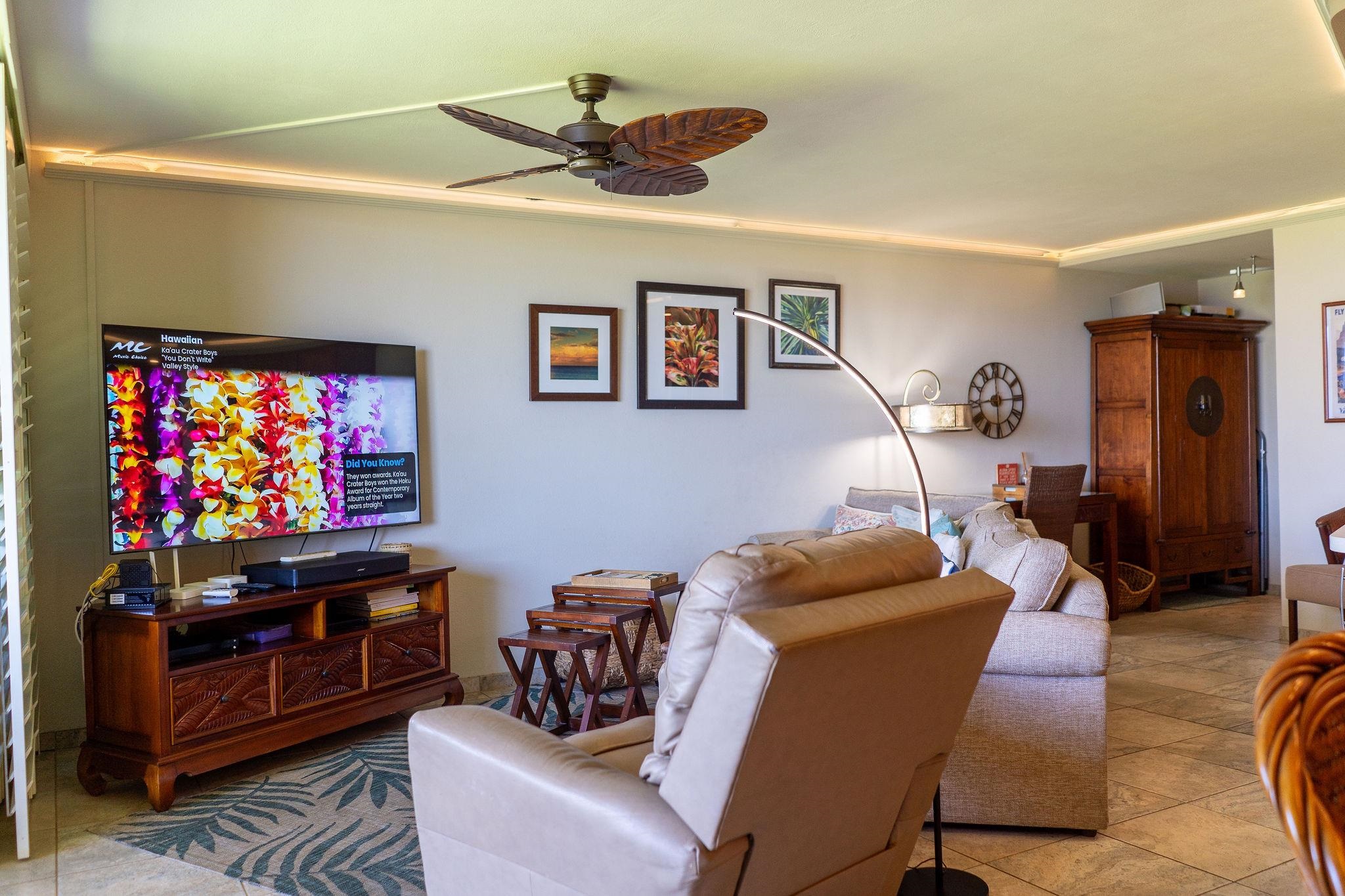 1032 South Kihei Road, Unit B420 Kihei, HI 96753 - Photo 3 of 47 a living room with furniture and a flat screen tv