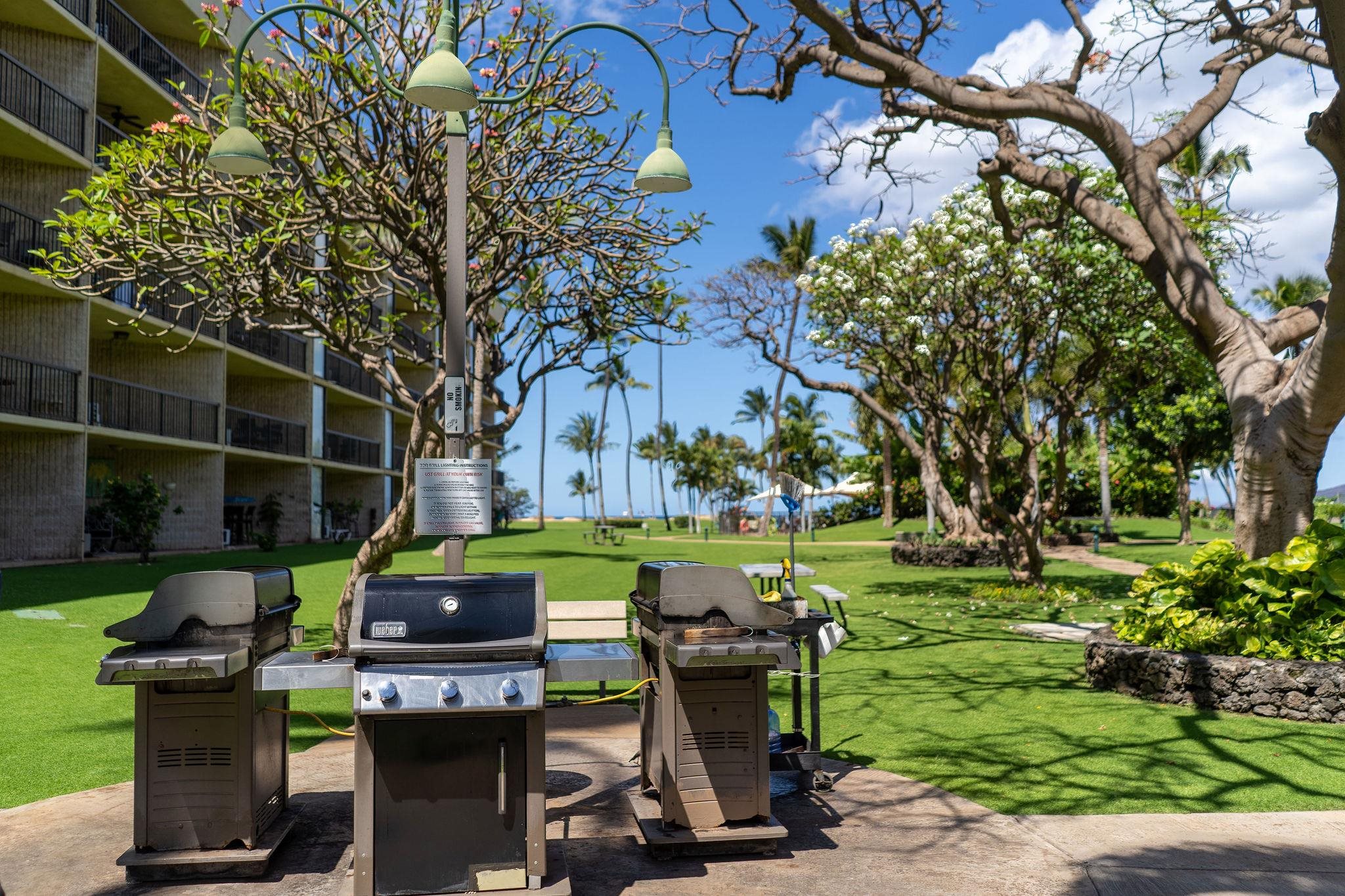 1032 South Kihei Road, Unit B420 Kihei, HI 96753 - Photo 44 of 47 a view of yard with seating area and trees around
