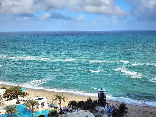 a view of an ocean from a balcony