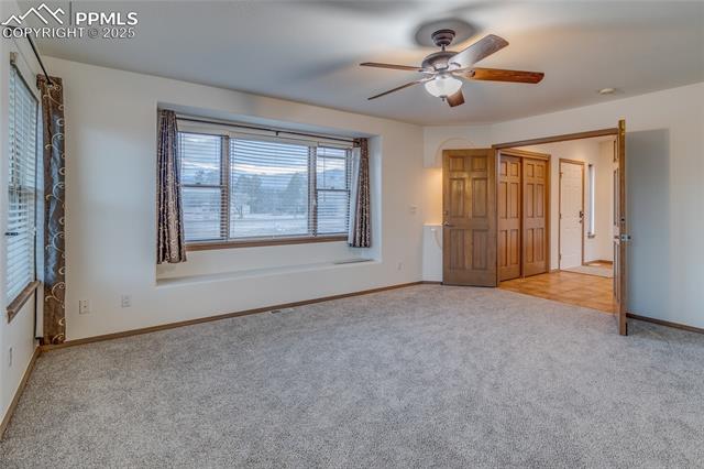 7501 Tudor Road Colorado Springs, CO 80919 - Photo 21 of 48 Primary bedroom