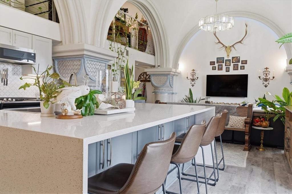 1 Pius Street, Unit B4 Pittsburgh, PA 15203 - Photo 11 of 41 a view of a dining room with furniture and a chandelier