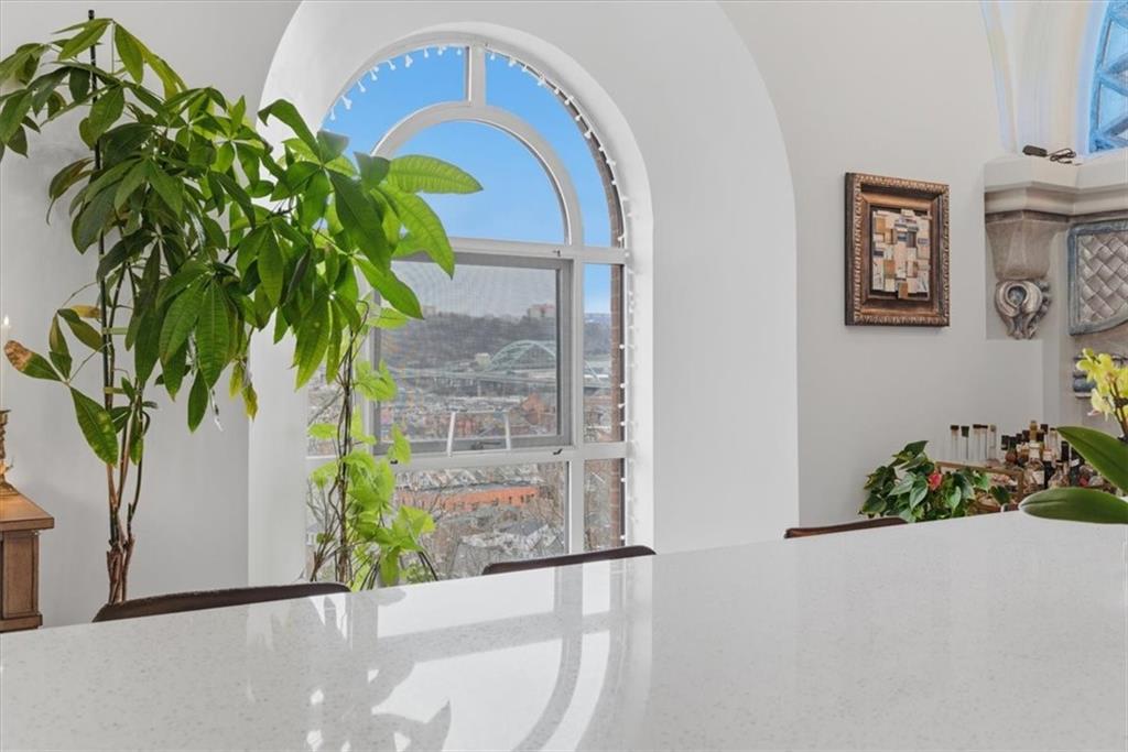 1 Pius Street, Unit B4 Pittsburgh, PA 15203 - Photo 14 of 41 a vase with flowers on a table in front of a window