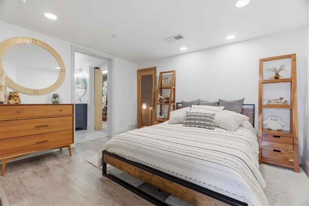 1 Pius Street, Unit B4 Pittsburgh, PA 15203 - Photo 19 of 41 a bedroom with a bed and a dresser