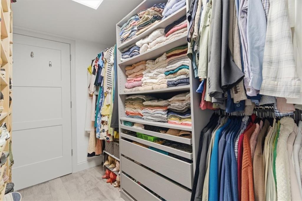 1 Pius Street, Unit B4 Pittsburgh, PA 15203 - Photo 24 of 41 a view of walk in closet with clothes and shoes
