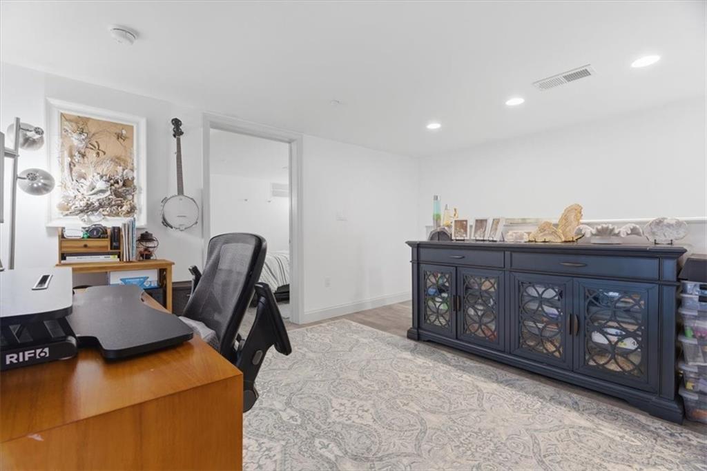 1 Pius Street, Unit B4 Pittsburgh, PA 15203 - Photo 27 of 41 a view of a workspace with furniture and window