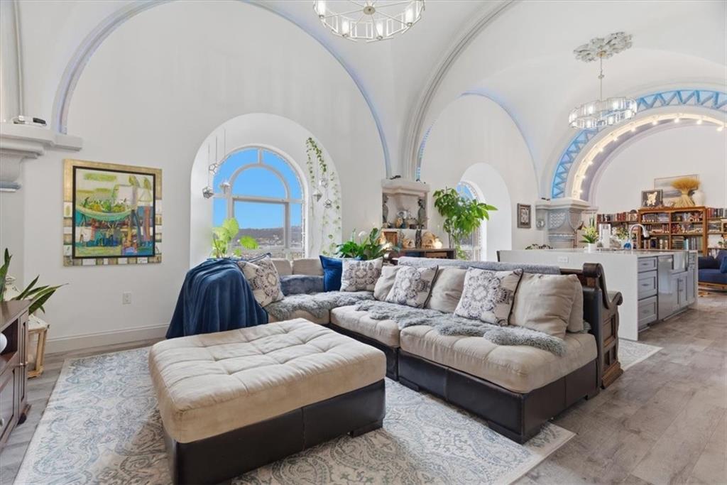 1 Pius Street, Unit B4 Pittsburgh, PA 15203 - Photo 3 of 41 a living room with furniture and a large window