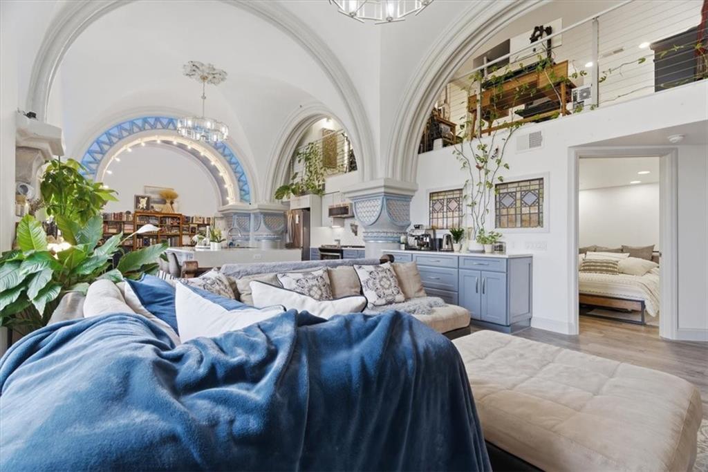 1 Pius Street, Unit B4 Pittsburgh, PA 15203 - Photo 5 of 41 a living room with furniture fireplace and a chandelier