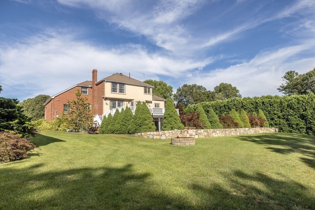 114 Upper Gore Road Webster, MA 01570 - Photo 32 of 40 a view of a big house with a big yard and plants