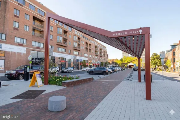 a view of a street with cars
