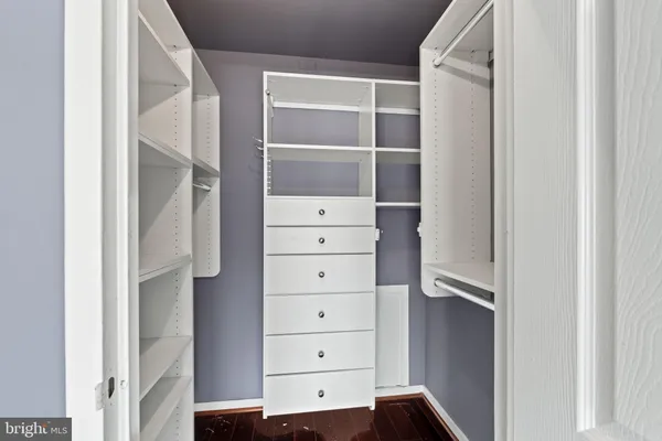 a view of an empty walk in closet
