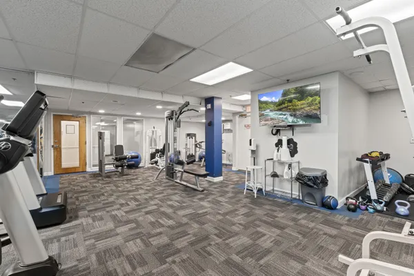 a view of a room with gym equipment