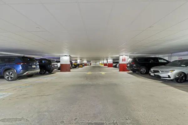 a view of cars parked in a parking lot