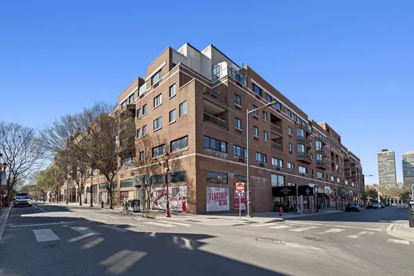 a view of a building and a street