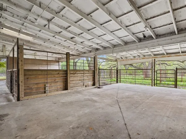 a view of an empty room with a balcony