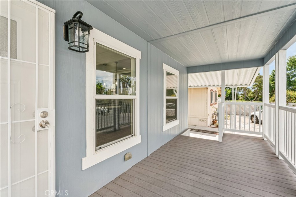 10550 Dunlap Crossing Road, Unit 141 Whittier, CA 90606 - Photo 5 of 38 a view of an entryway with wooden floor and door