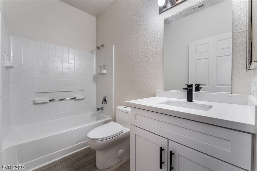 4730 East Craig Road, Unit 1058 Las Vegas, NV 89115 - Photo 25 of 30 A well-appointed bath features modern fixtures and sleek finishes for everyday rejuvenation.