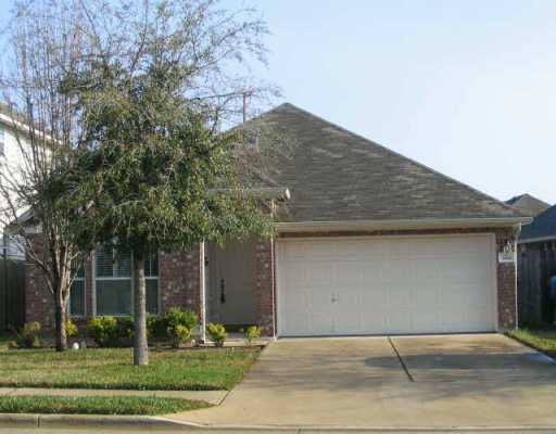3616 Bratton Ridge Crossing Austin, TX 78728 - Photo 1 of 1 a front view of a house with a garden