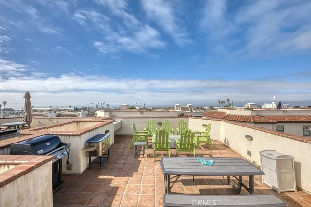 a view of a balcony with furniture
