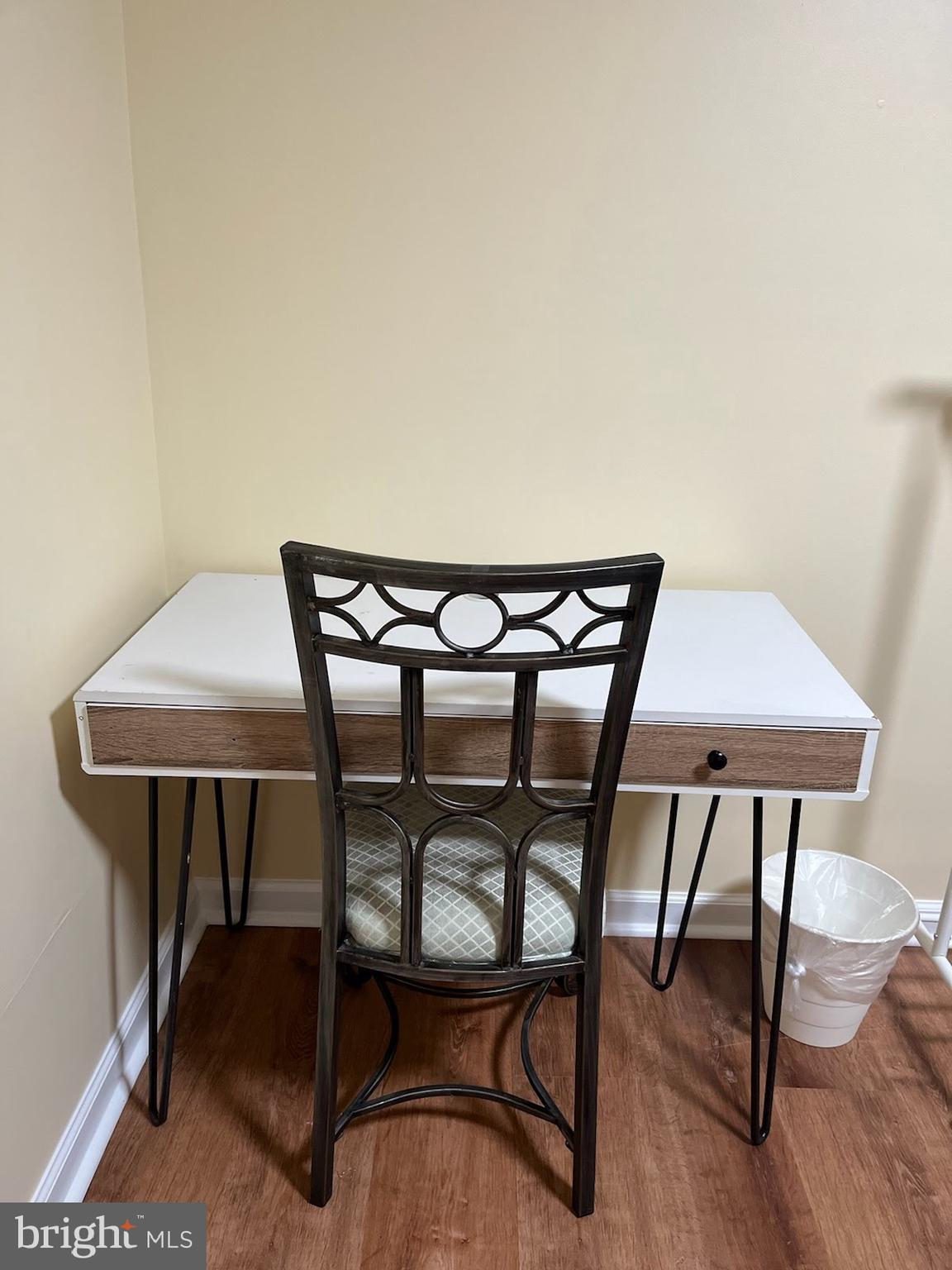 7288 Flaxpool Court Hanover, MD 21076 - Photo 11 of 23 a view of a dining room with furniture and wooden floor