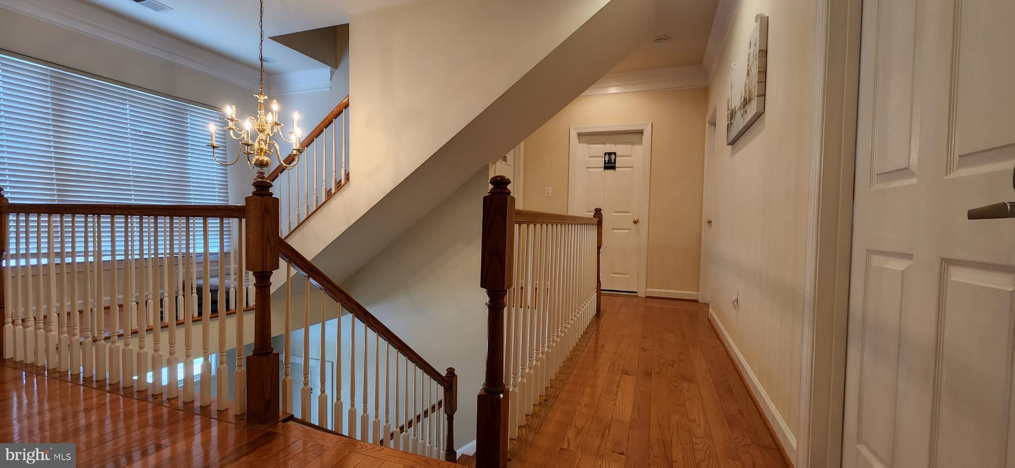 7288 Flaxpool Court Hanover, MD 21076 - Photo 3 of 23 a view of staircase with railing and white walls