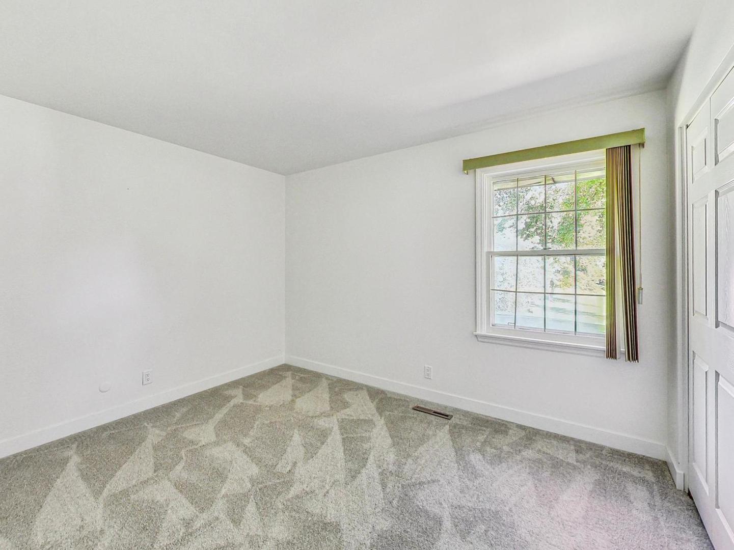 4618 William Street Johnsburg, IL 60051 - Photo 17 of 40 an empty room with a window