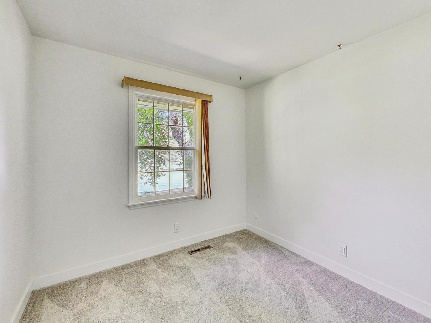 4618 William Street Johnsburg, IL 60051 - Photo 20 of 40 an empty room with a window