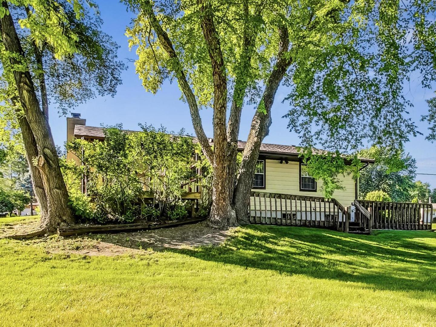 4618 William Street Johnsburg, IL 60051 - Photo 34 of 40 a view of a house with a small yard
