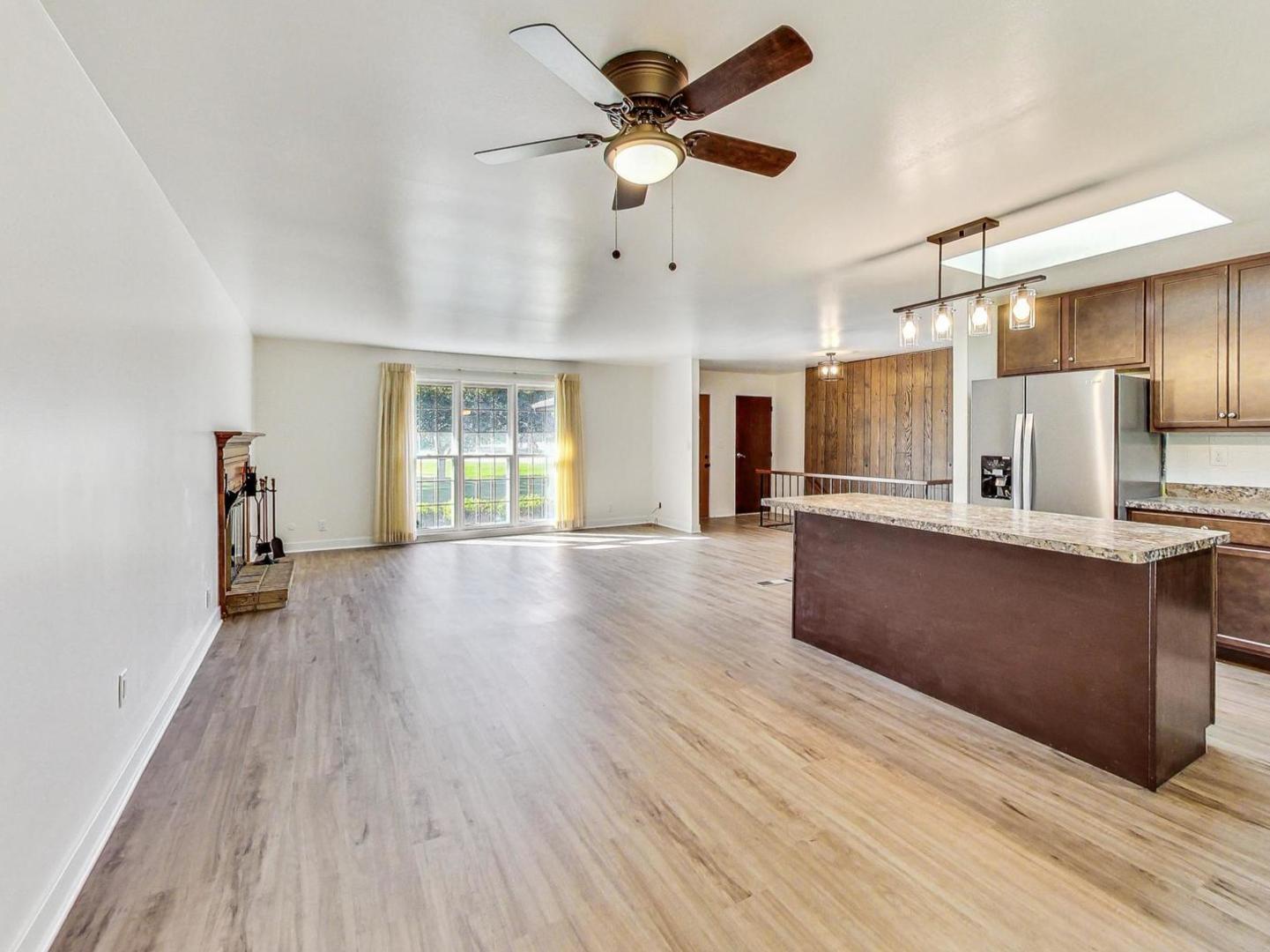 4618 William Street Johnsburg, IL 60051 - Photo 8 of 40 a view of kitchen with sink microwave and refrigerator