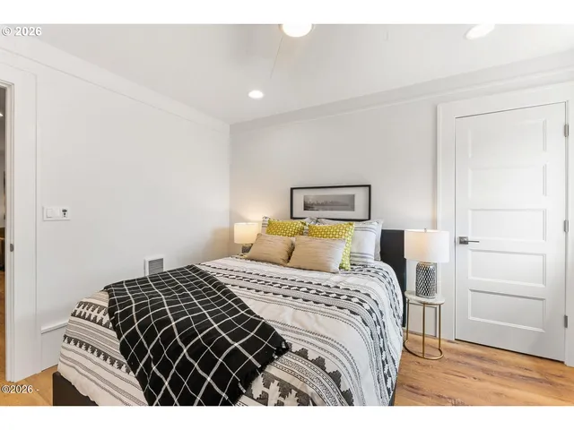 a bedroom with a bed and a cabinets