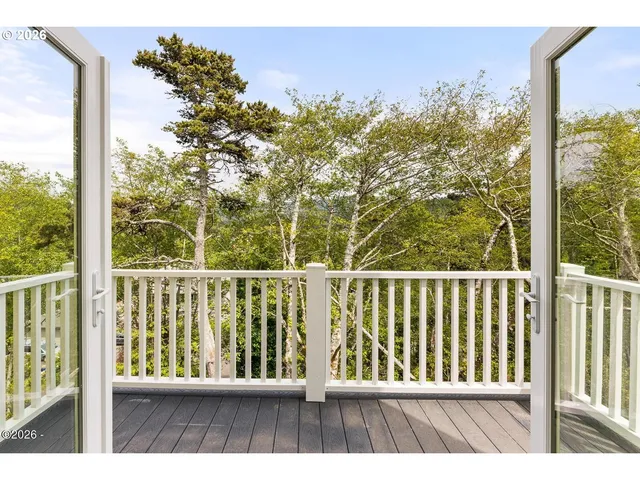 a view of balcony with furniture