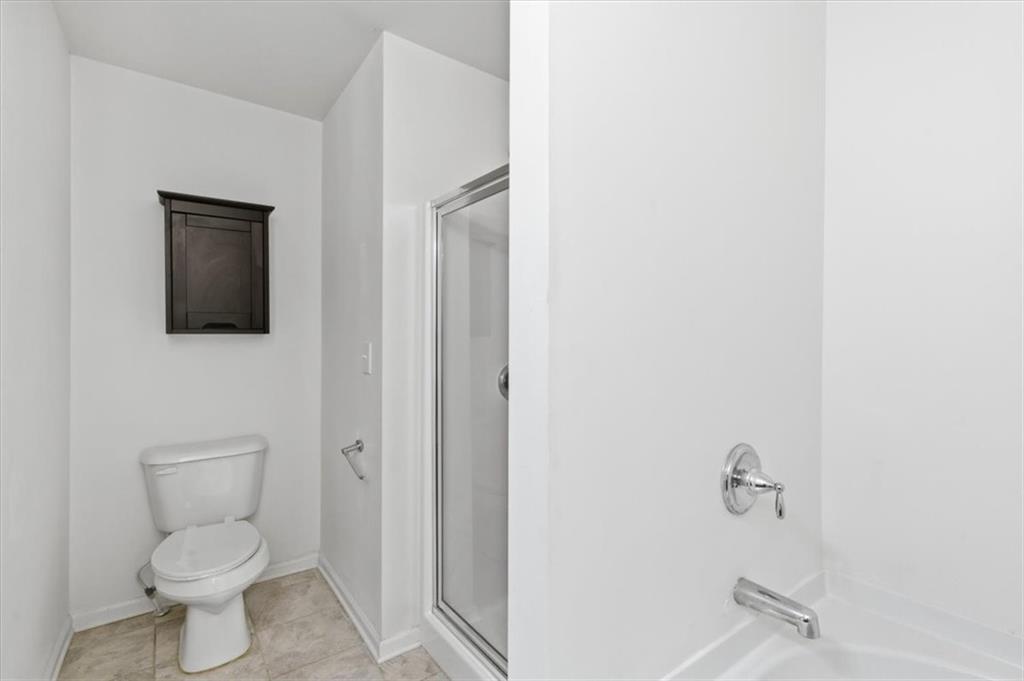 5064 Longview Walk Decatur, GA 30035 - Photo 24 of 30 a bathroom with a toilet and a sink