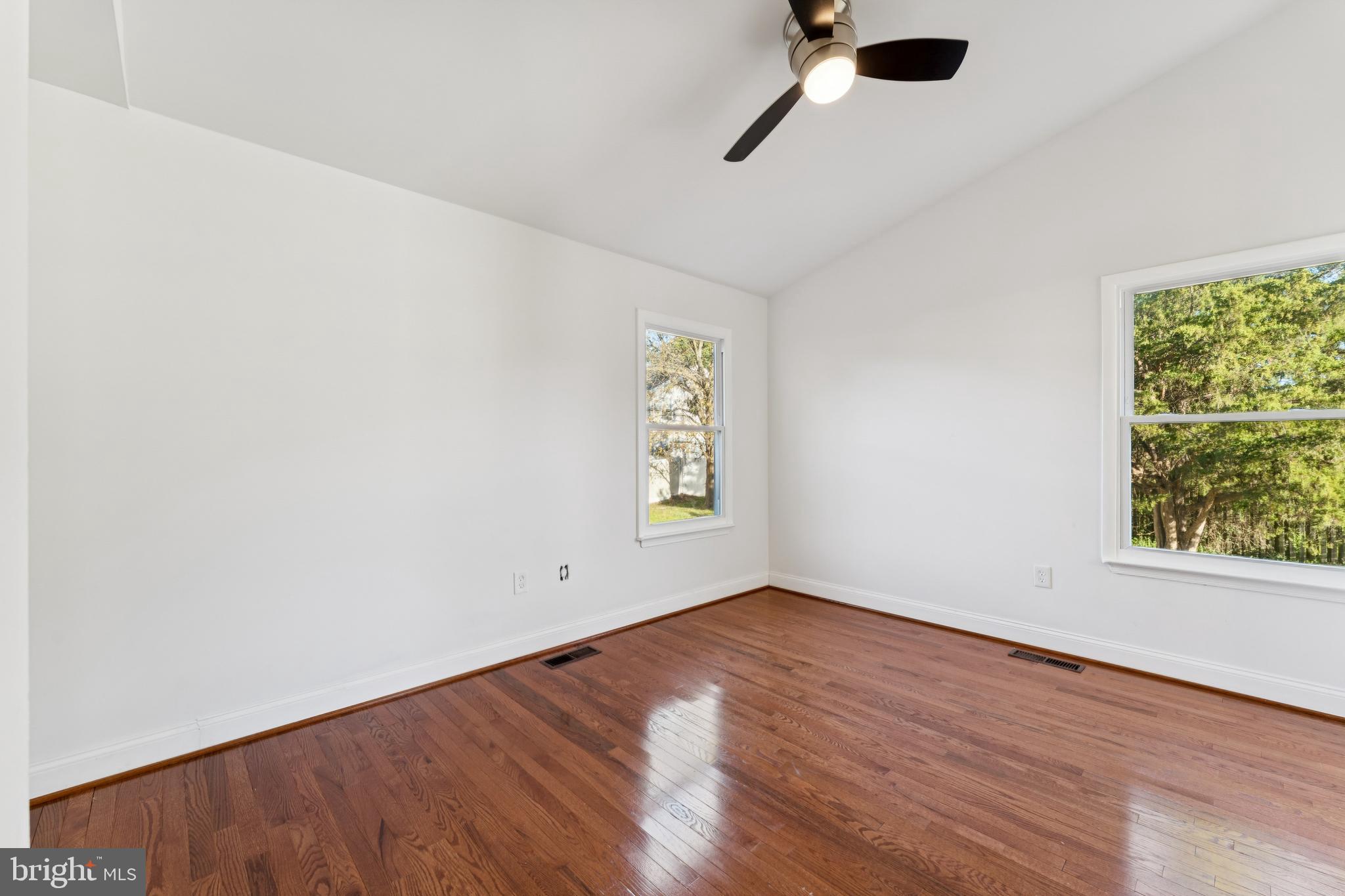 2107 High Timber Road Fort Washington, MD 20744 - Photo 17 of 30 an empty room with a window and a ceiling fan