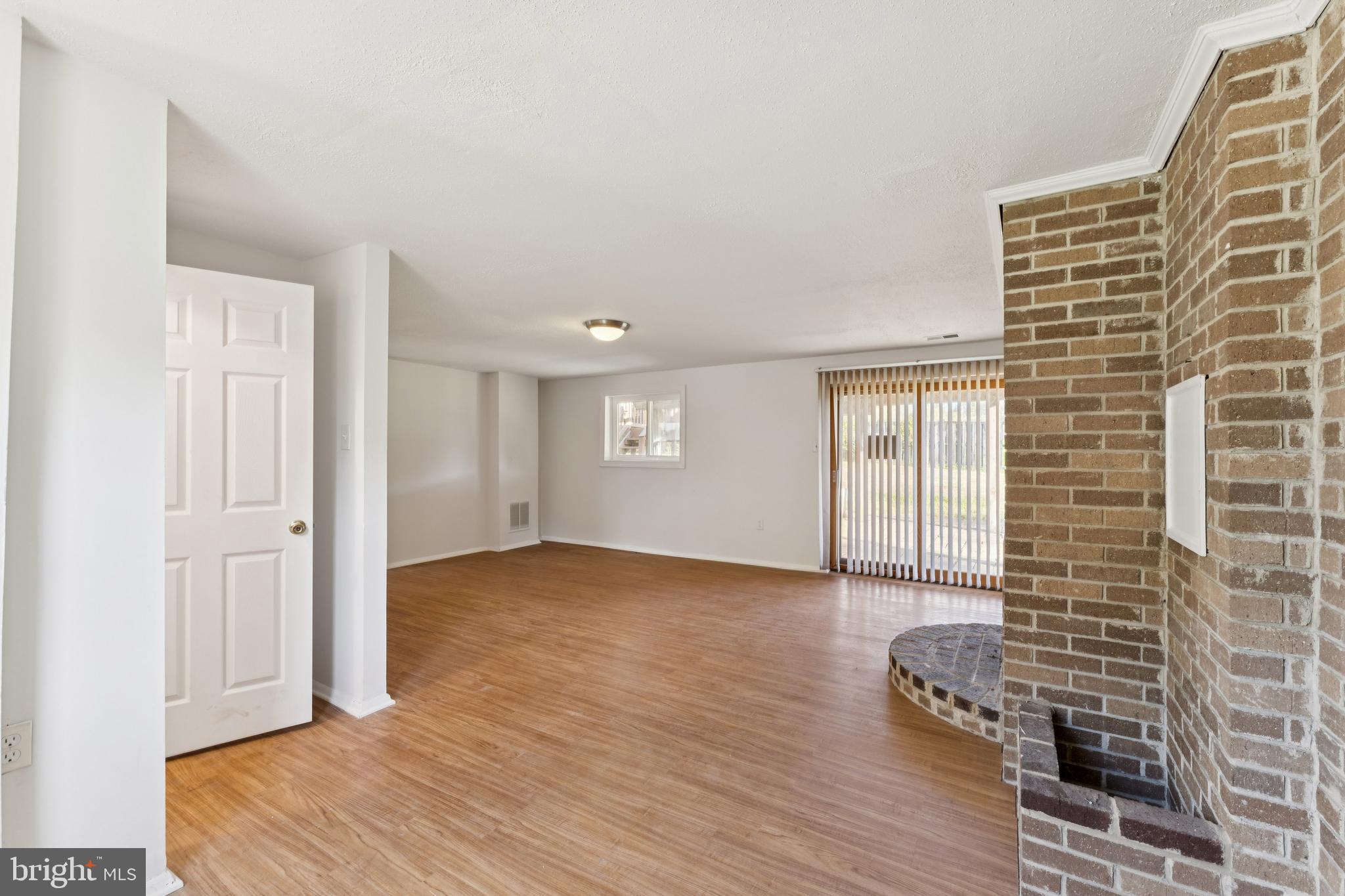 2107 High Timber Road Fort Washington, MD 20744 - Photo 22 of 30 wooden floor and windows in a room