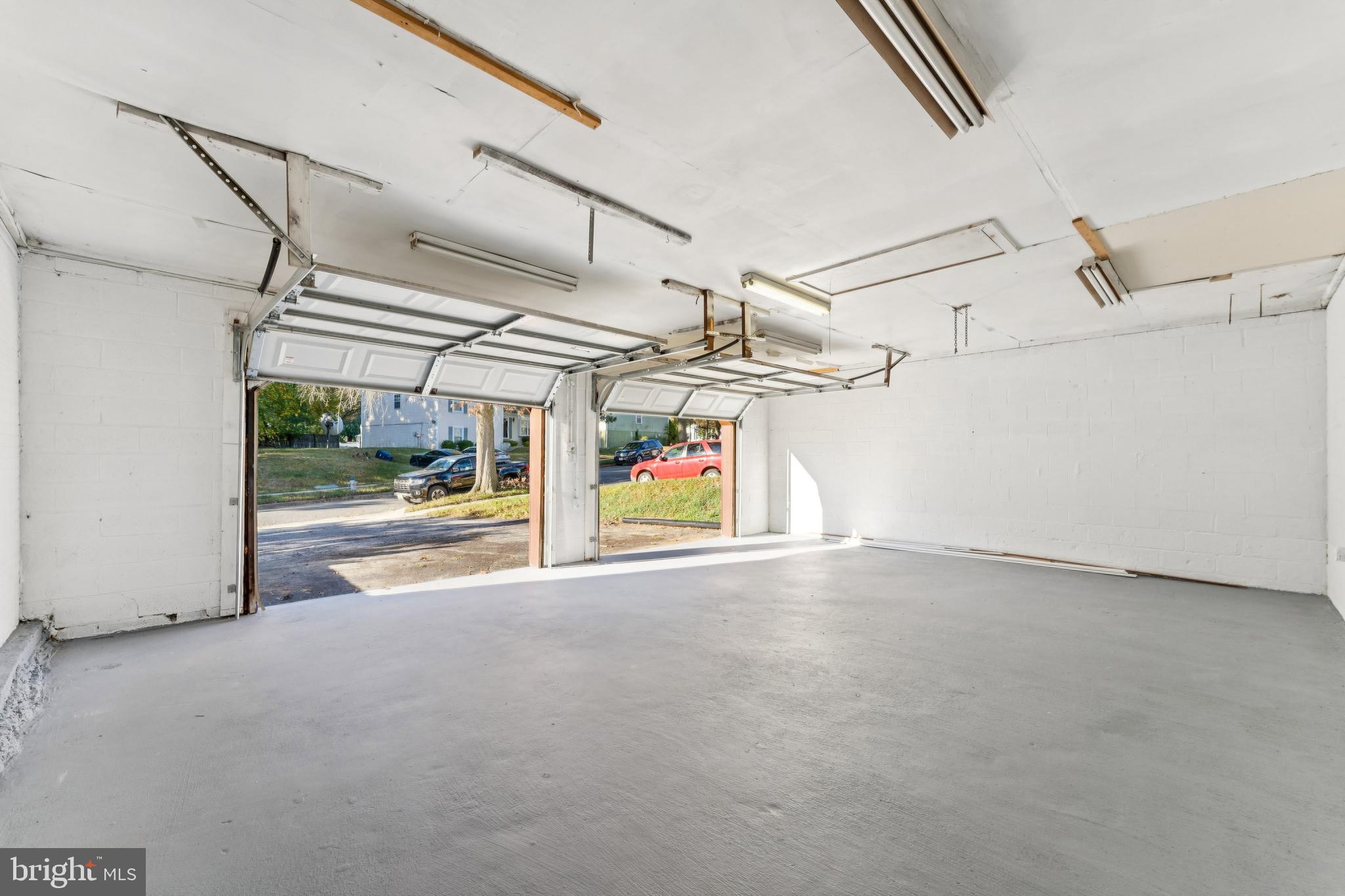 2107 High Timber Road Fort Washington, MD 20744 - Photo 25 of 30 a view of a garage with a white bed