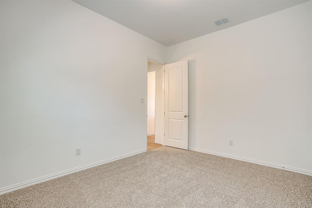 909 Schuberts Road Justin, TX 76247 - Photo 27 of 34 a view of an empty room