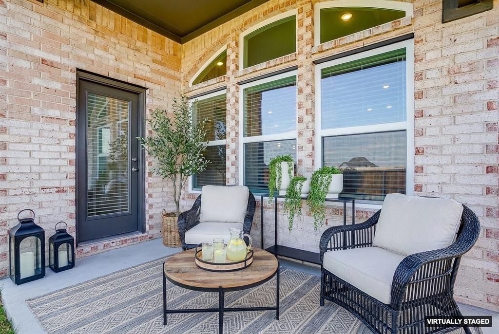 909 Schuberts Road Justin, TX 76247 - Photo 29 of 34 a outdoor living room with furniture