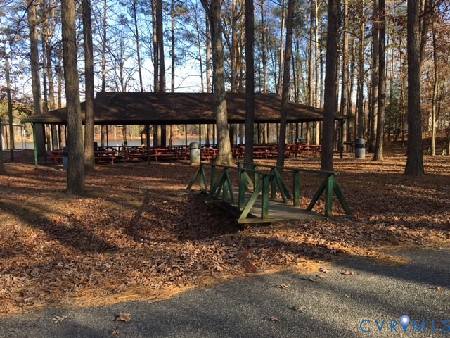100 Hessian Drive Ruther Glen, VA 22546 - Photo 19 of 22 a view of a house with a yard and furniture