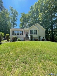 100 Hessian Drive Ruther Glen, VA 22546 - Photo 2 of 22 a front view of house with yard and green space