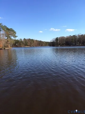 a view of terrace with wooden floor and seating space