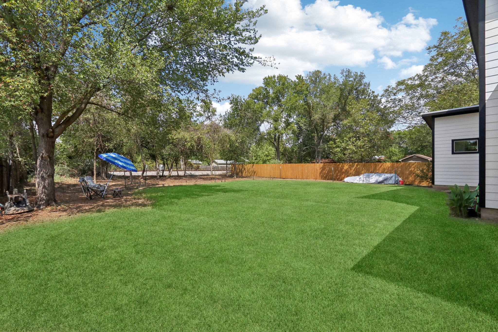 604 Wilhelm Street Bastrop, TX 78602 - Photo 32 of 39 a view of green field with sitting area