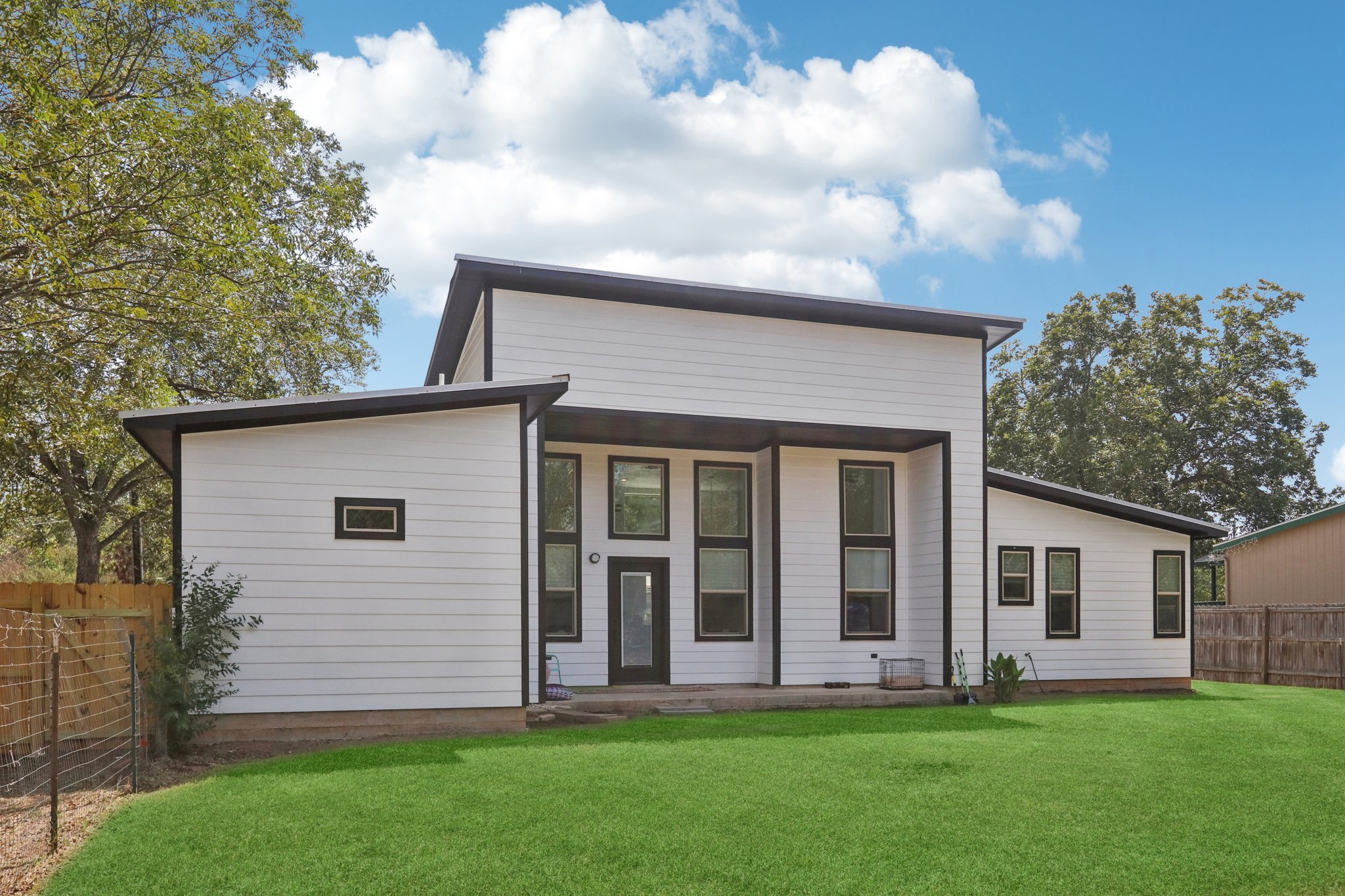 604 Wilhelm Street Bastrop, TX 78602 - Photo 4 of 39 a view of a house with a yard