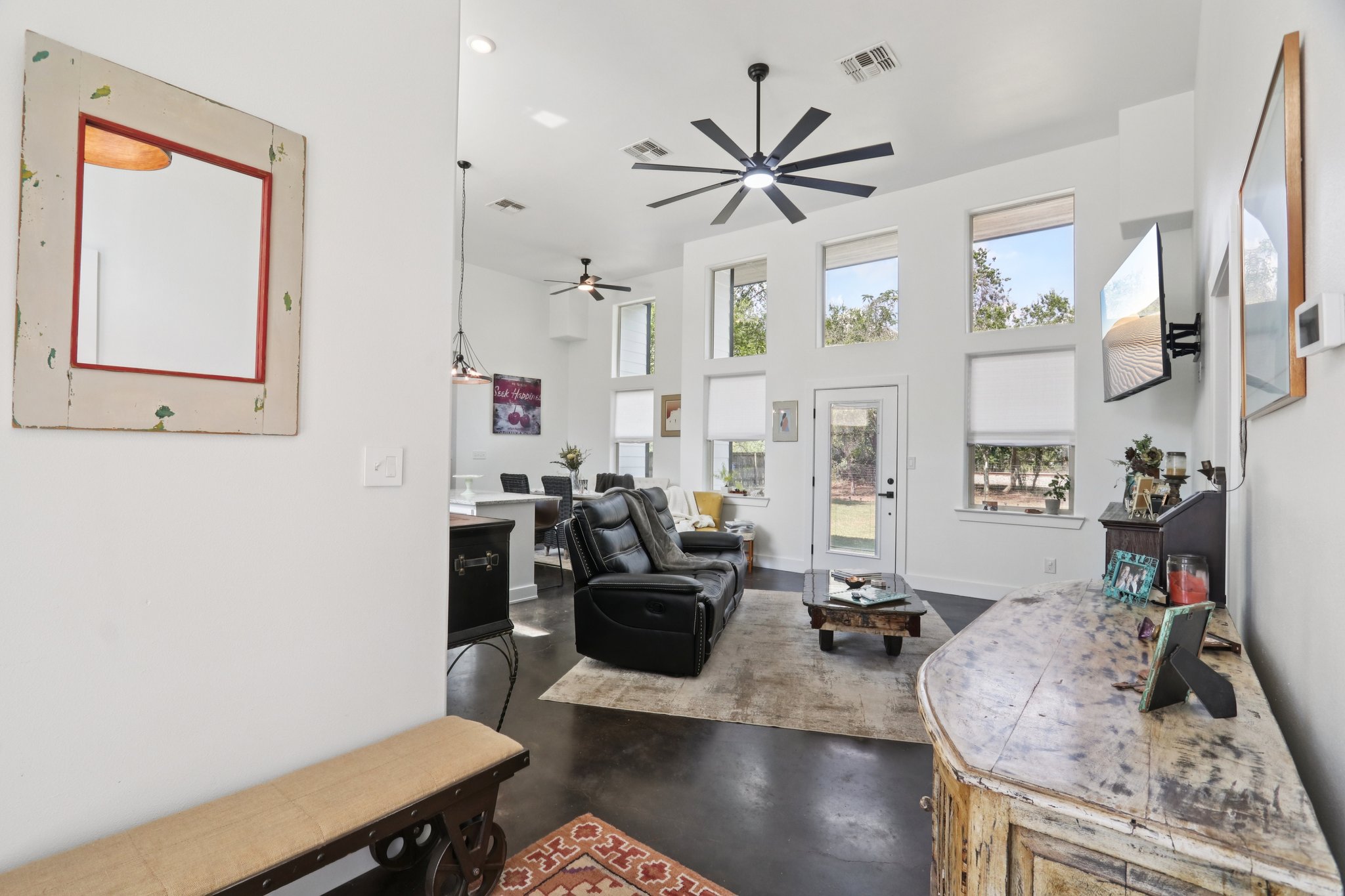 604 Wilhelm Street Bastrop, TX 78602 - Photo 9 of 39 a living room with fireplace furniture and a wooden floor