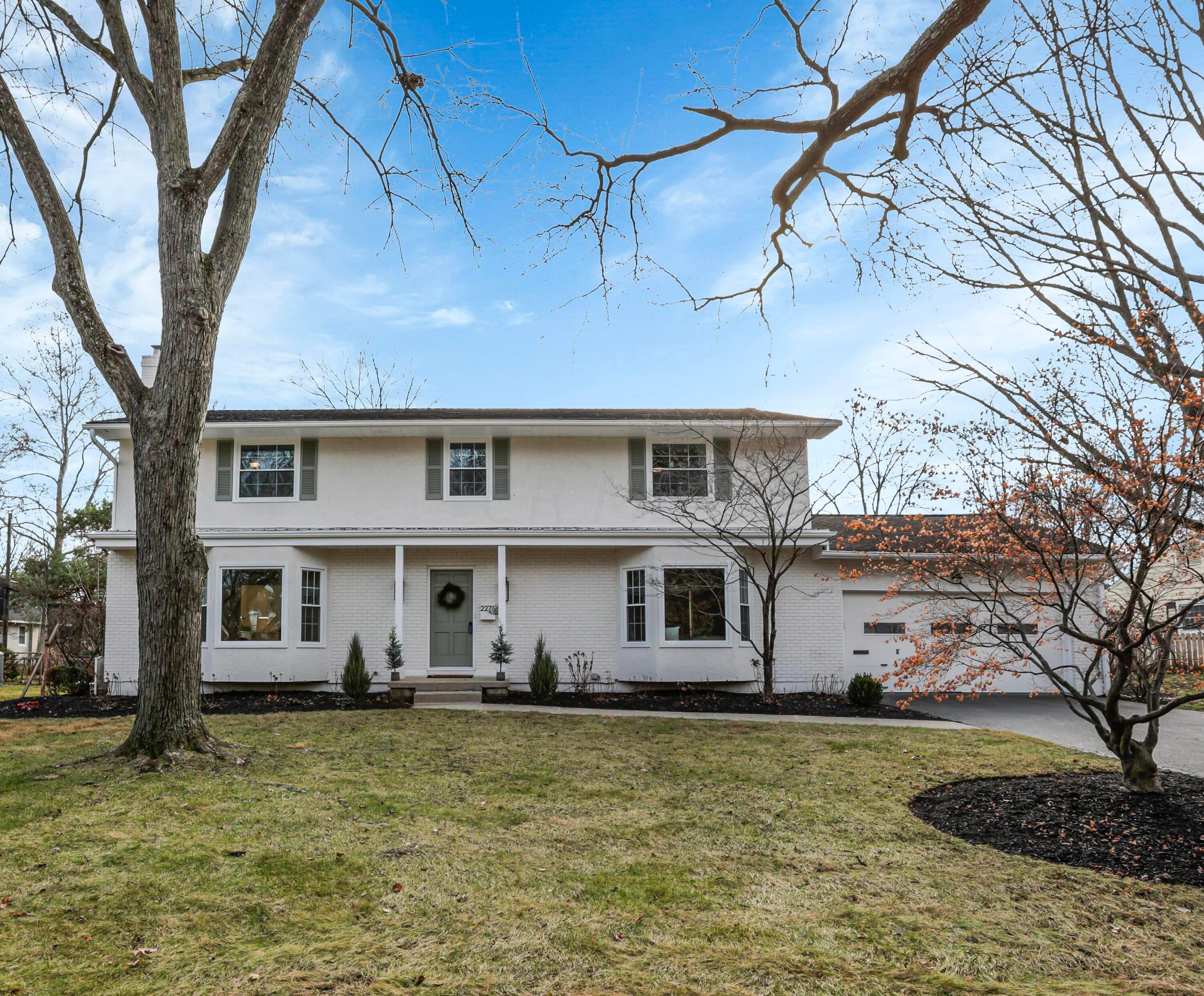 This extensive renovation begins with the freshly painted exterior, new windows and completely redesigned landscaping.